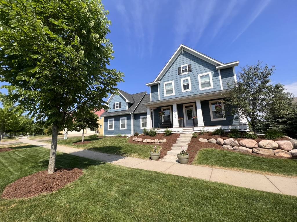 Angled view showing full property and neighborhood